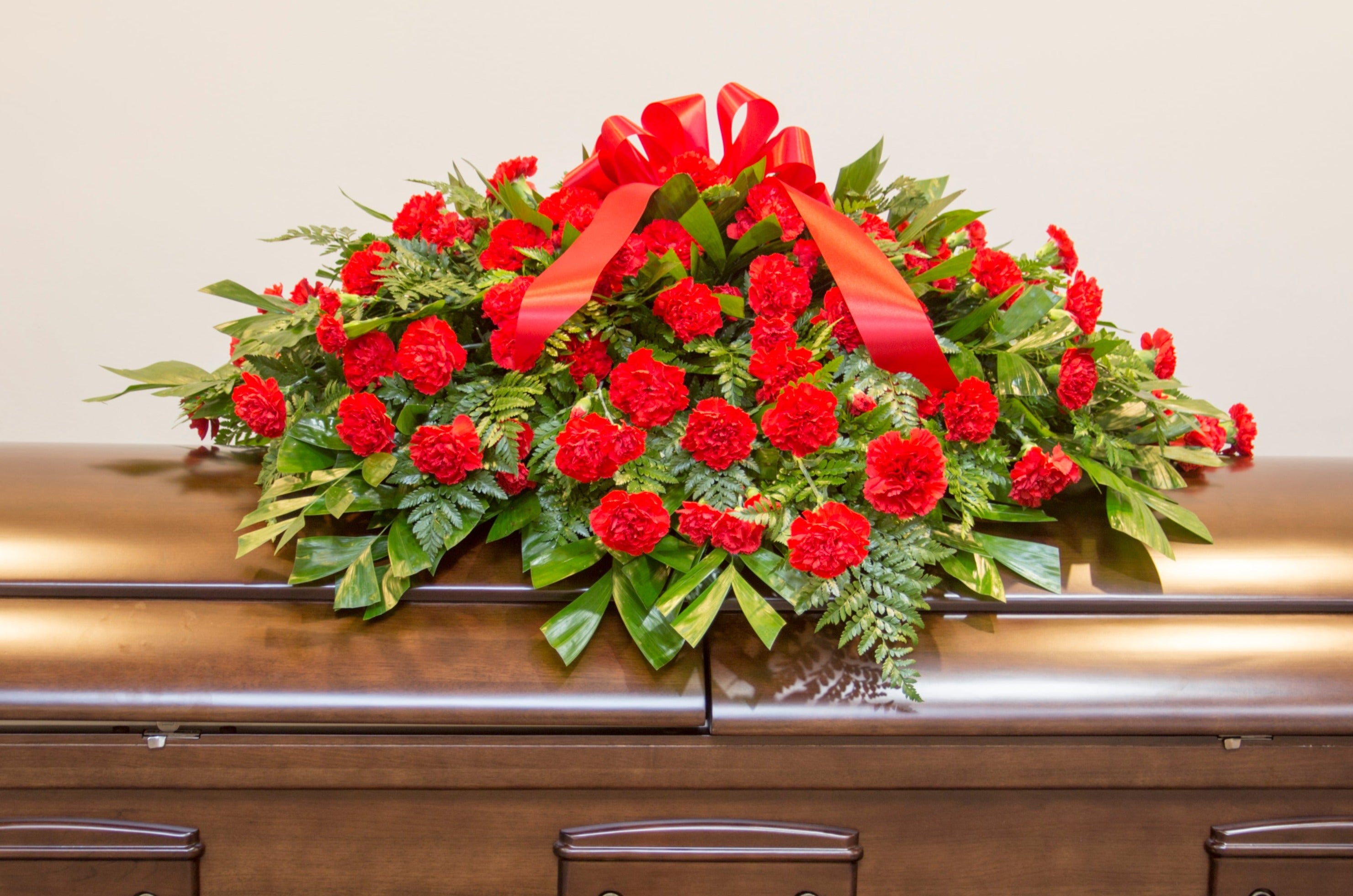 Carnation Melody Casket Spray